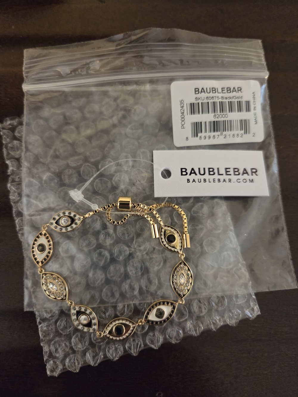 BaubleBar Gold and Black Evil Eye Slider Bracelet